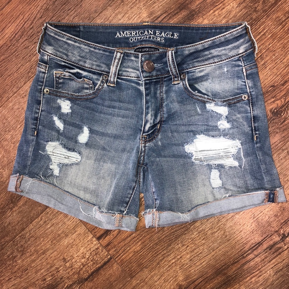 Folded Distressed long shorts .. with a few holes